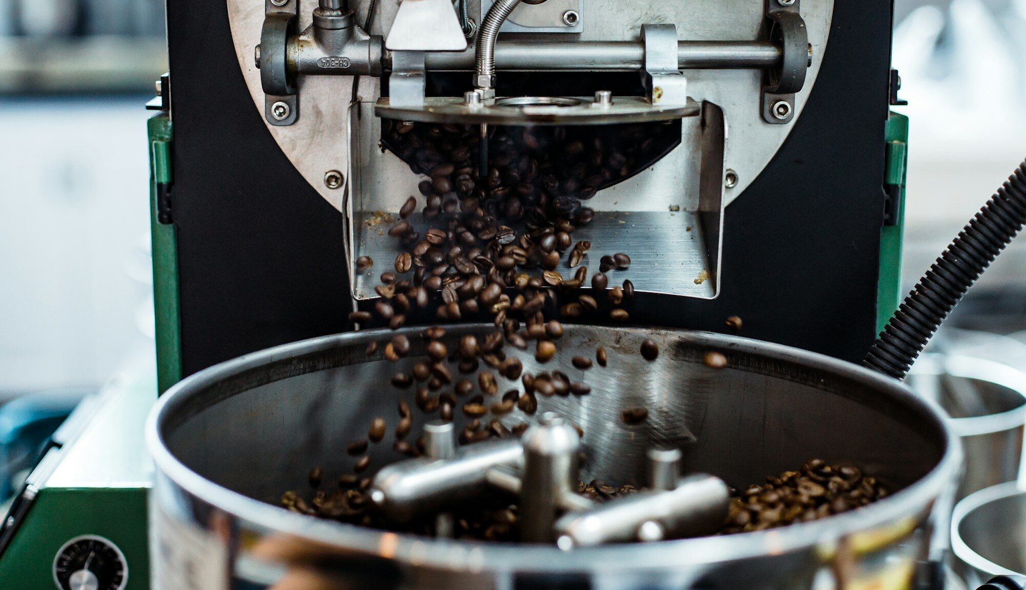 Freshly roasted beans tumbling out of the roaster