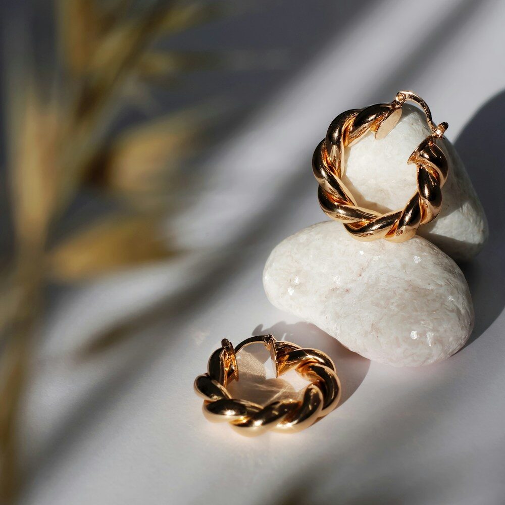 Hand-carved cameo drop earrings in gold